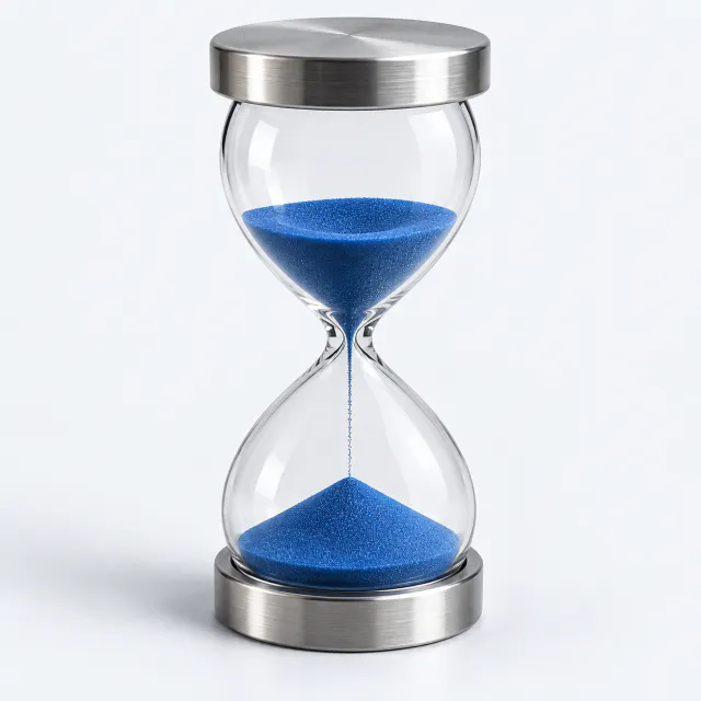 Glass hourglass with cobalt-blue sand between brushed steel circular end caps